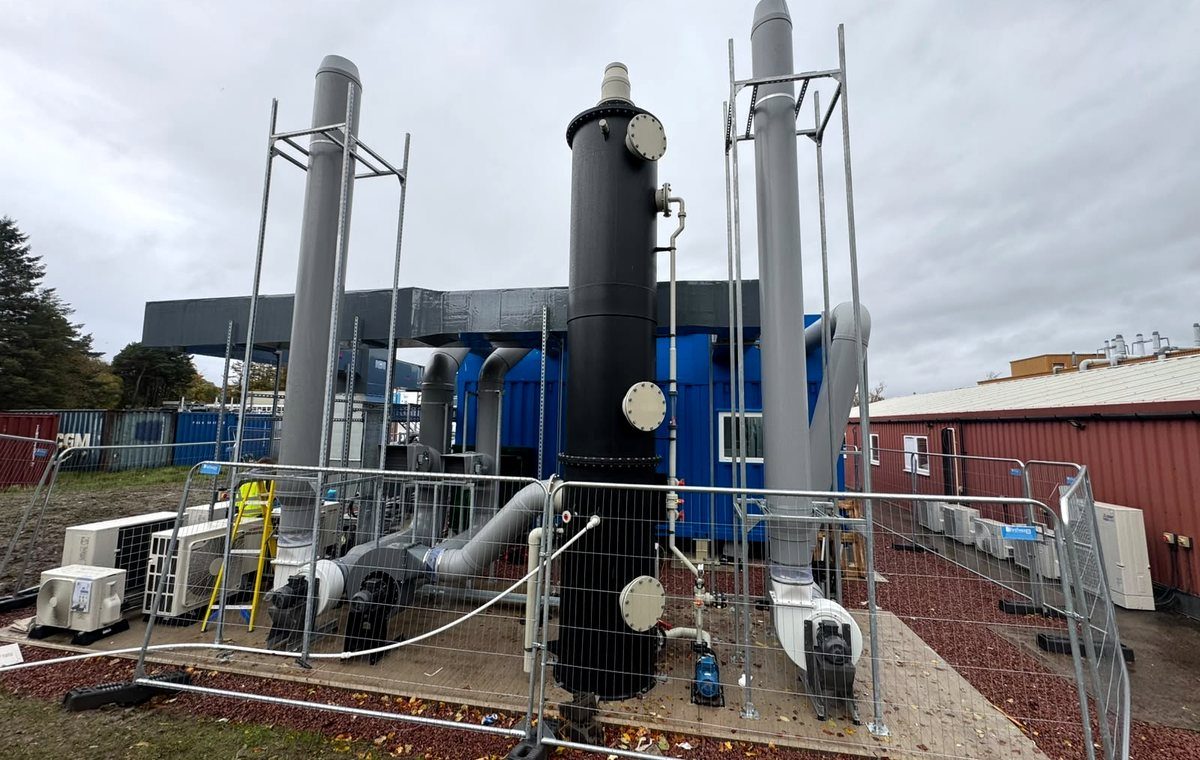 Packed tower installed between two extract stacks with fans and ductwork